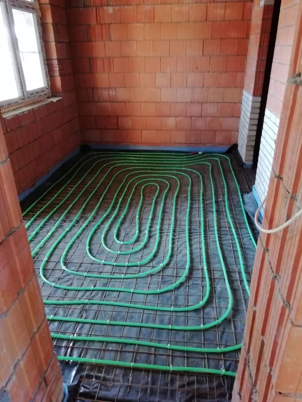 Underfloor Heating Installation in a Brick House