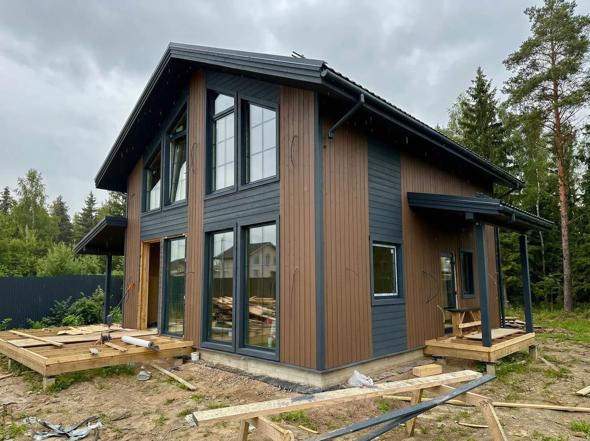 Two-story frame house with panoramic glazing 5